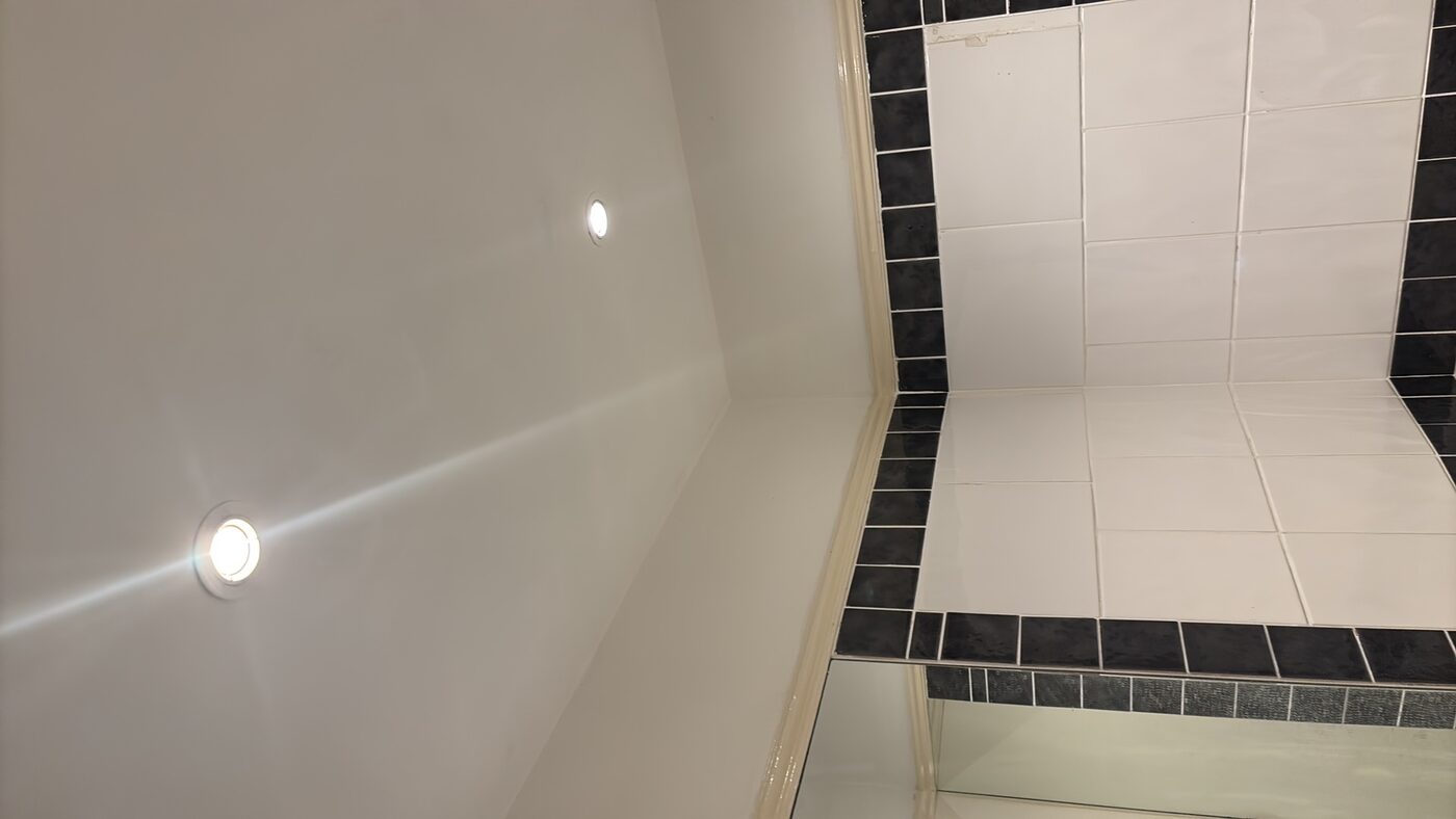 Source identified: bathroom ceiling in the flat above showing water ingress
