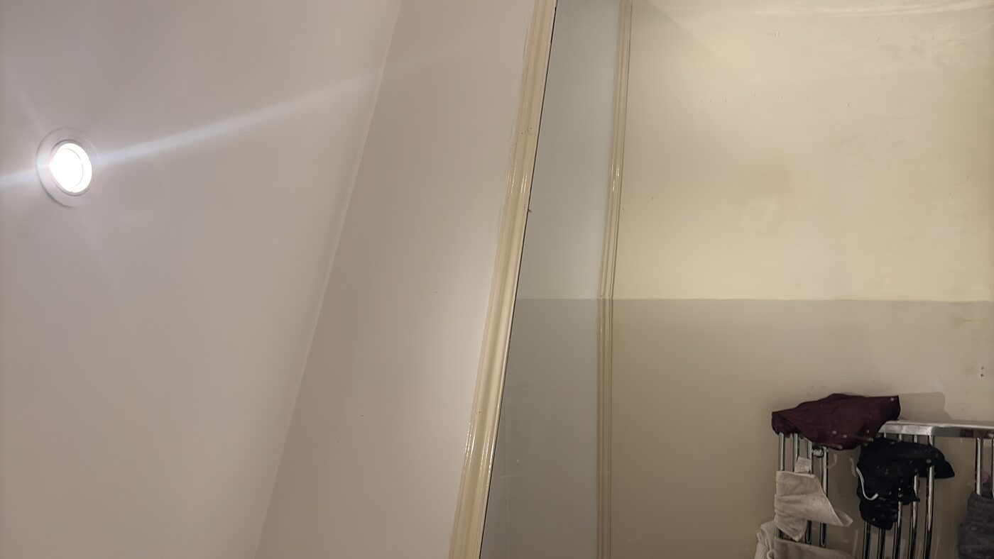Wall staining in source flat — bath overflow had been travelling down into floor void