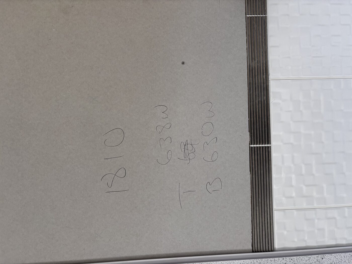 Aqua panels measured and marked up before cutting