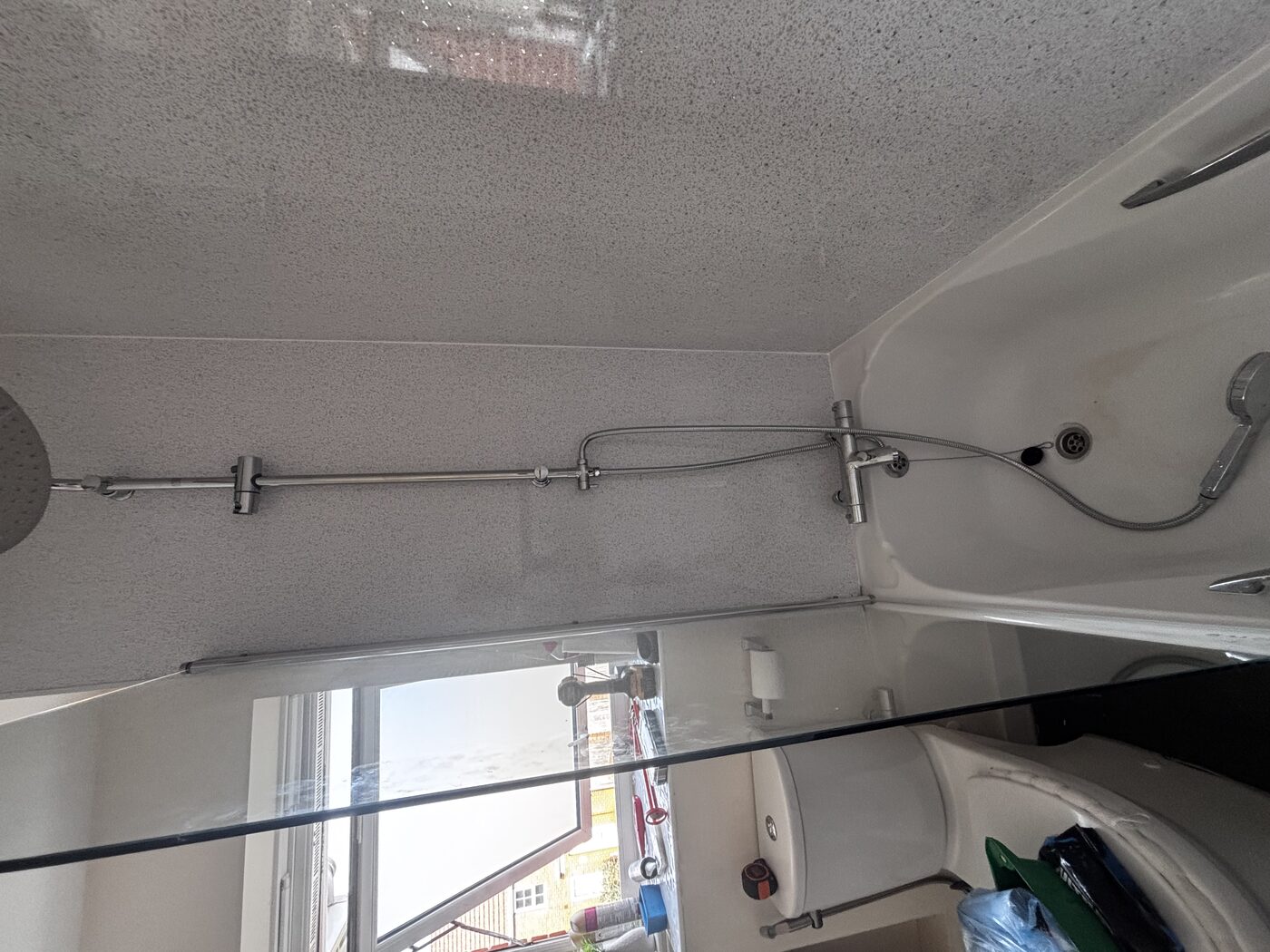 Thermostatic bar shower with rainfall head and hand attachment