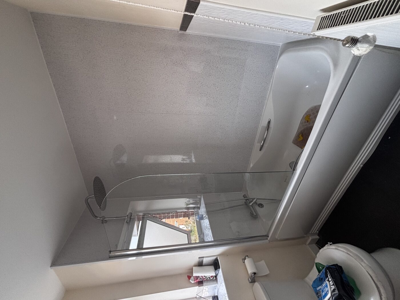 Folding bath screen and full aqua panel surround — complete transformation