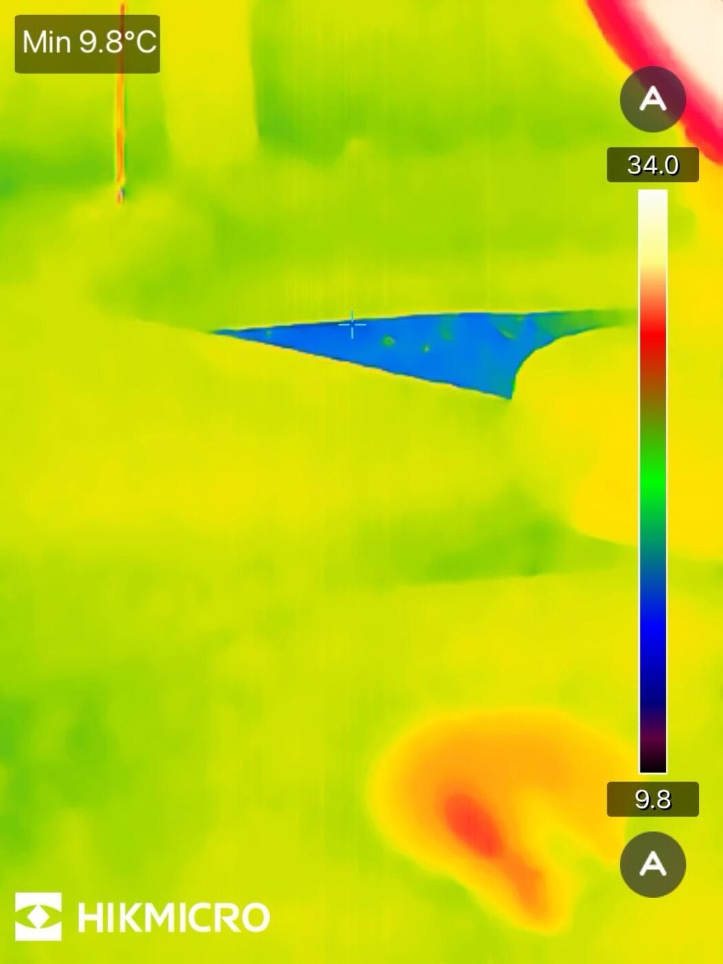 Thermal image of floor: cold blue area confirms leak location precisely