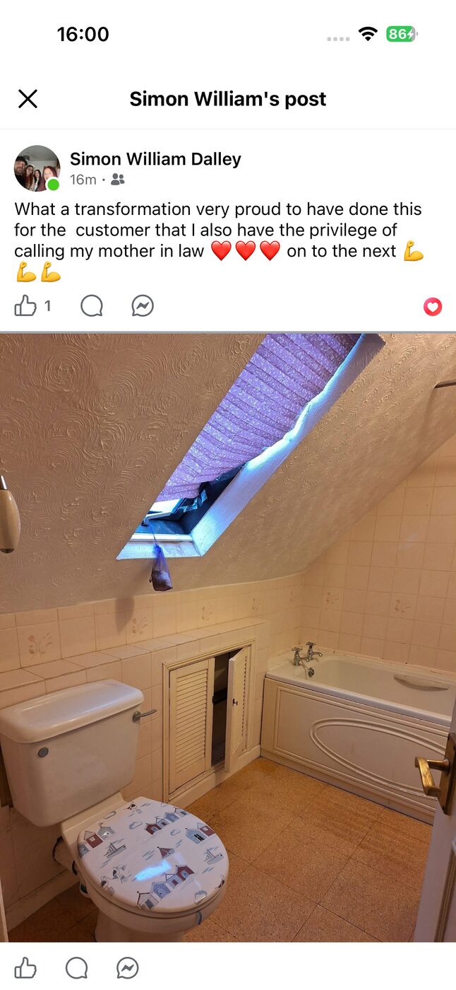 Existing bathroom before renovation — original suite, old tiling, Velux window