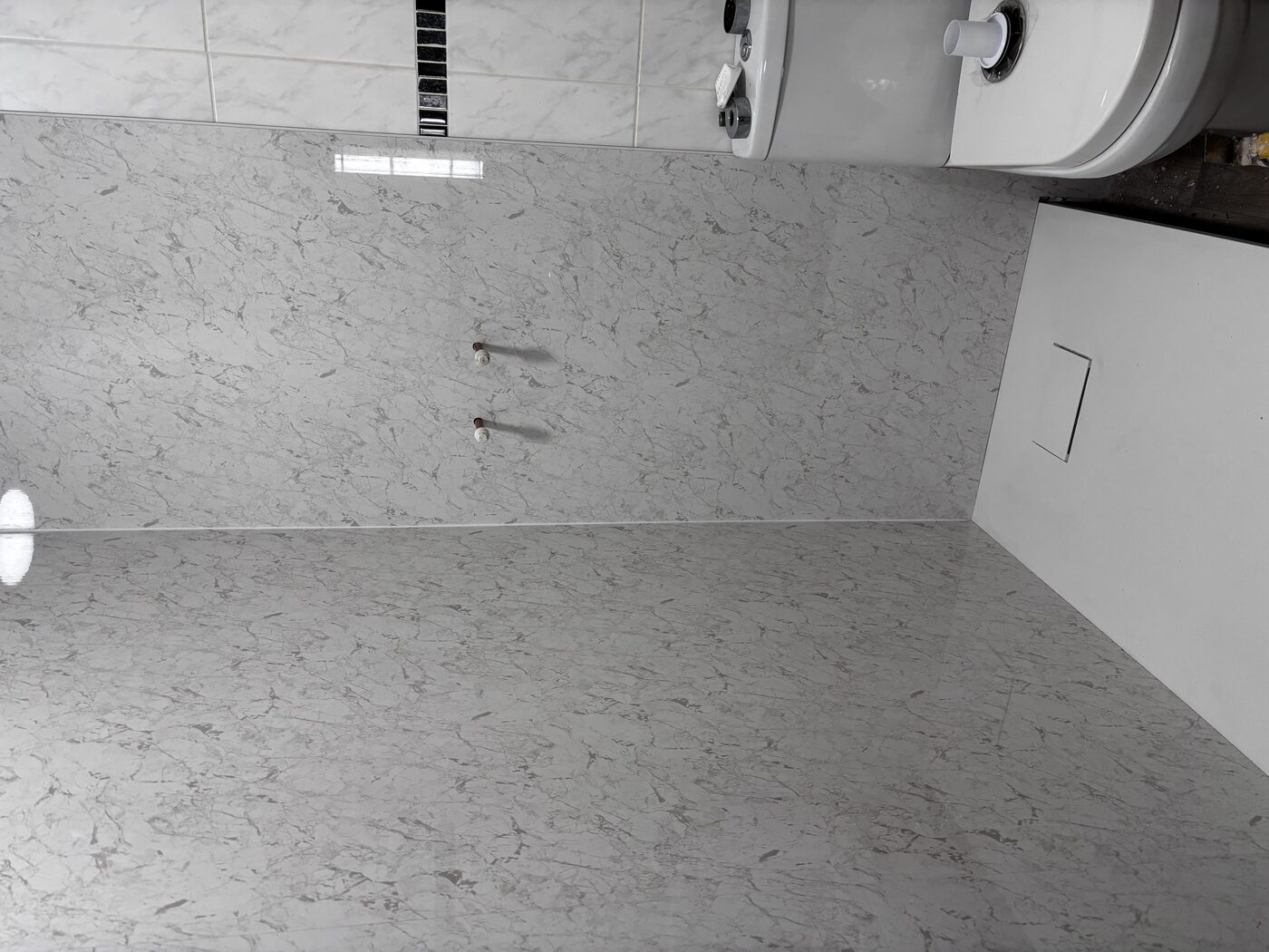 Panels grouted and sealed — watertight finish