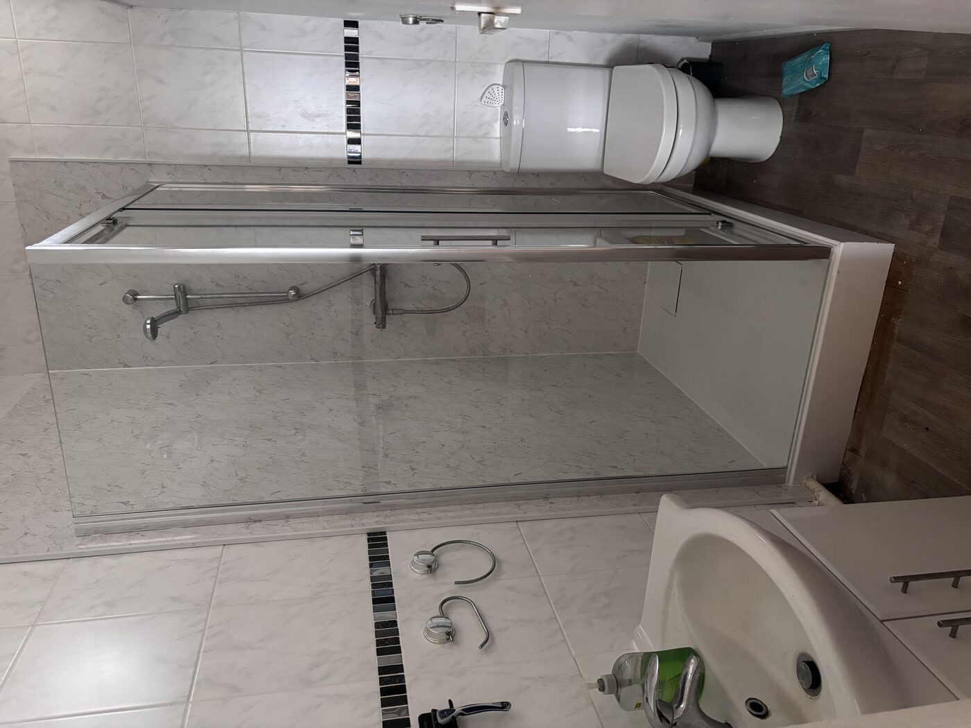 Finished — glass enclosure, new drain cover, spotlights above
