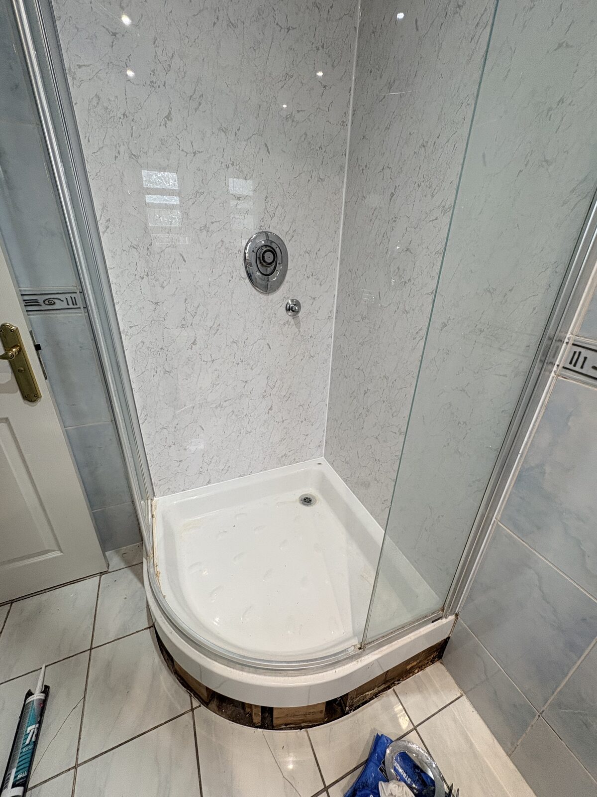 Wider view of the shower enclosure and wall panels while the Ryde job was in progress