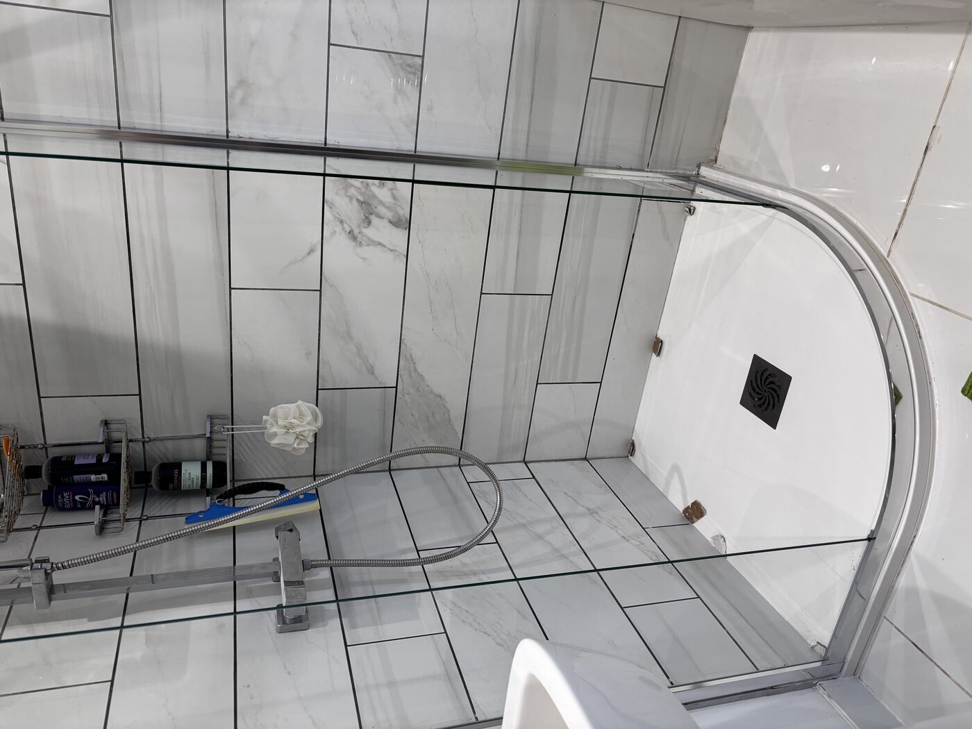 Tray seated, glass screen panels going in