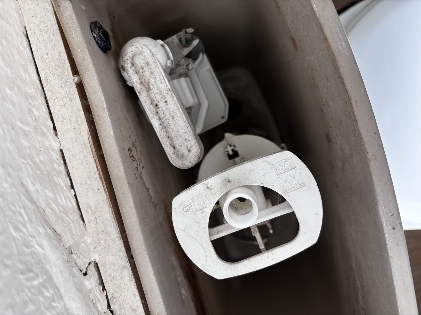 Faulty fill valve — worn and failing to refill the cistern correctly