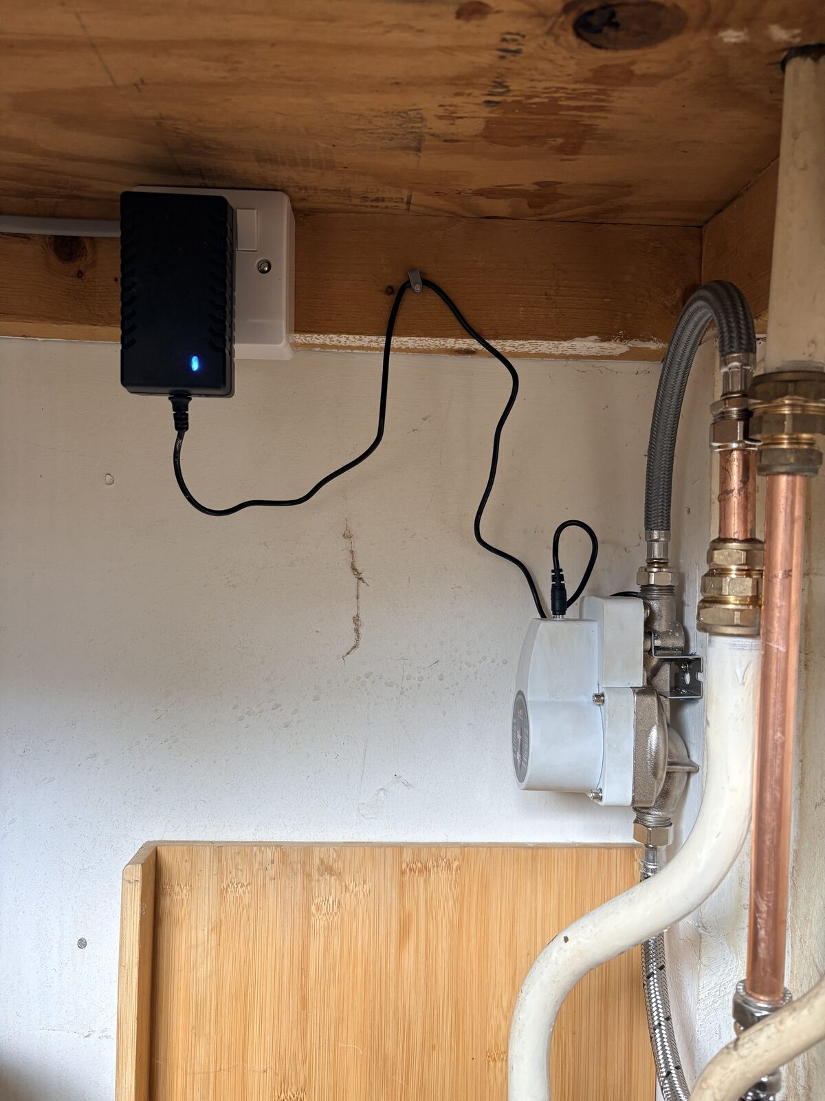Wider view of the completed booster pump installation and power supply